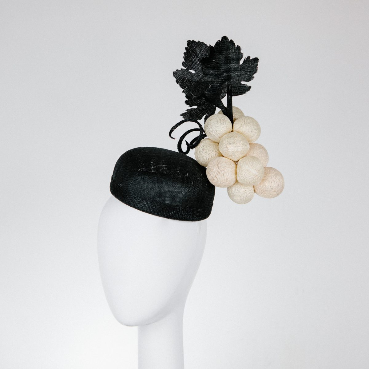 creative headpieces Cream and black for derby day